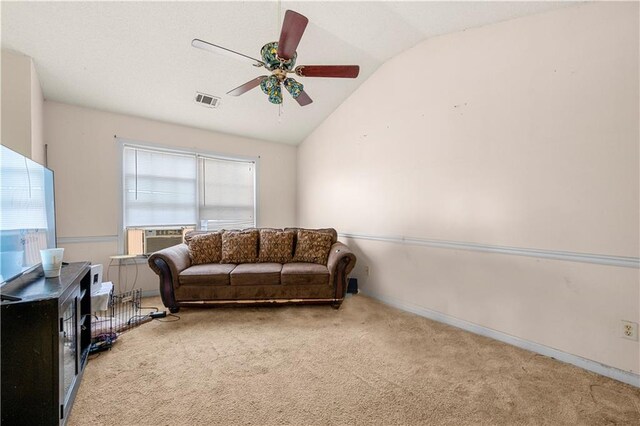 carpeted living room with ceiling fan, cooling unit, a healthy amount of sunlight, and vaulted ceiling