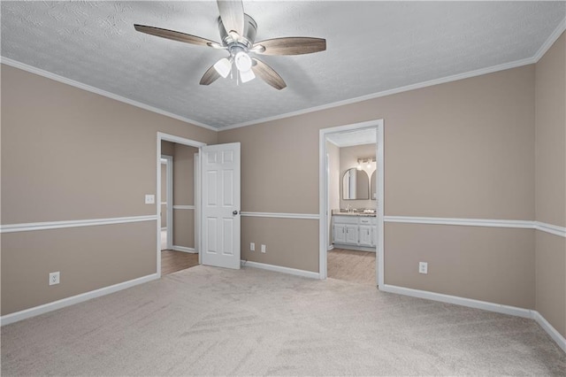 356 Chardonnay Trce, Braselton, GA 30517 - unfurnished bedroom featuring a textured ceiling, carpet floors, ensuite bathroom, a ceiling fan, and crown molding
