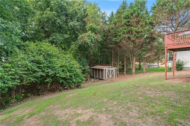 356 Chardonnay Trce, Braselton, GA 30517 - view of grassy yard with a storage unit and a wooden deck
