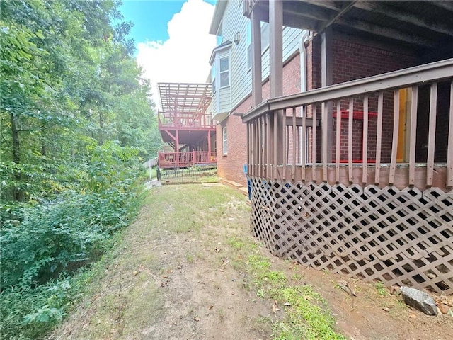 view of yard featuring a deck