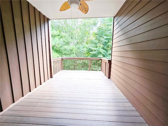 wooden deck with ceiling fan