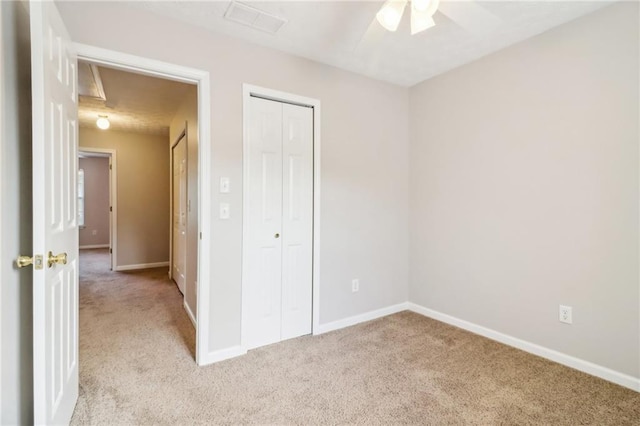 unfurnished room with carpet floors and a textured ceiling