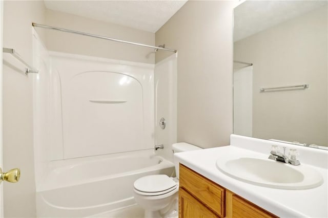 carpeted empty room with ceiling fan and a textured ceiling