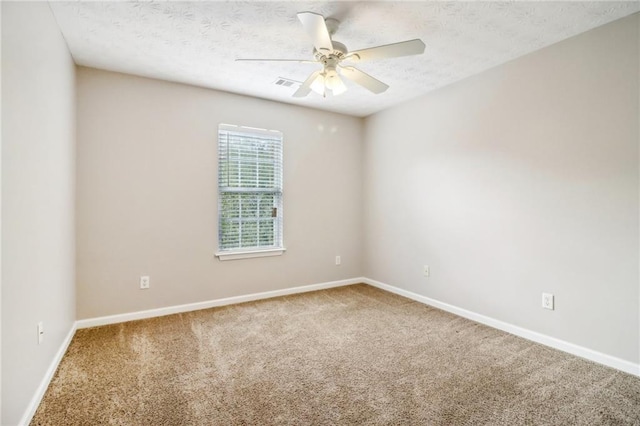 unfurnished bedroom with ceiling fan, light carpet, and a closet