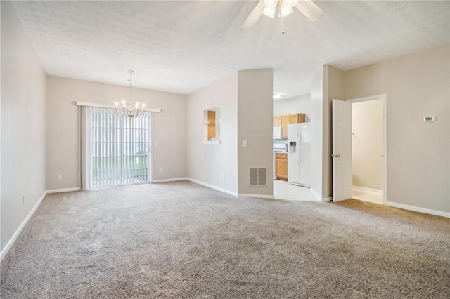 unfurnished living room featuring ceiling fan and carpet floors