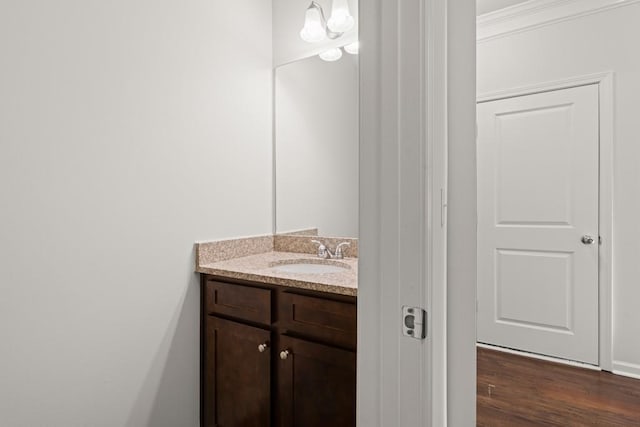 bathroom featuring vanity and wood finished floors