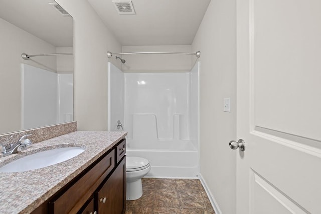 bathroom featuring vanity, baseboards, visible vents, shower / tub combination, and toilet