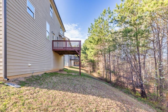 view of yard with a wooden deck