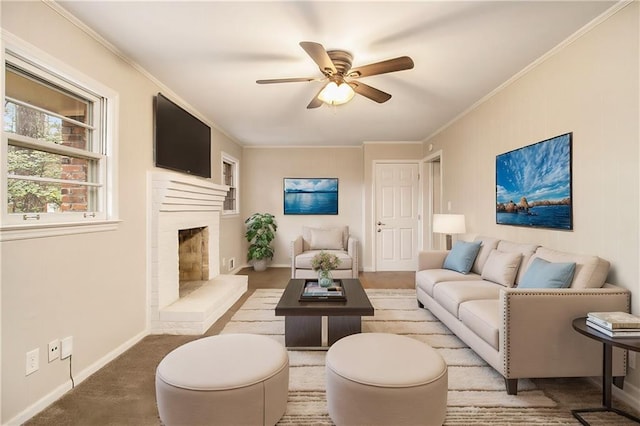 living room featuring ceiling fan and ornamental molding