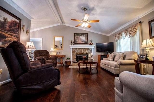 living room featuring a stone fireplace, ceiling fan, hardwood / wood-style floors, vaulted ceiling with beams, and ornamental molding