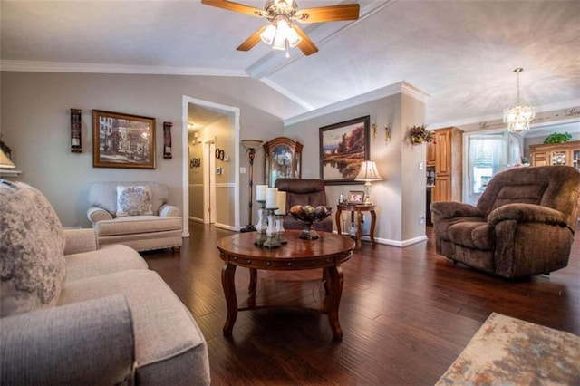 living room featuring vaulted ceiling, dark hardwood / wood-style flooring, and crown molding