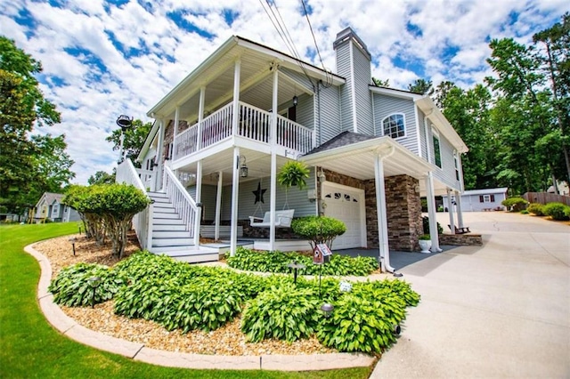 exterior space featuring a garage and a porch