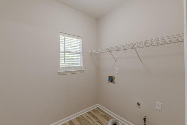 3329 Walt Stephens Rd, Stockbridge, GA 30281 - washroom with light wood-style flooring, hookup for an electric dryer, and washer hookup