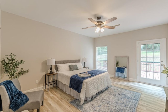 3329 Walt Stephens Rd, Stockbridge, GA 30281 - bedroom with access to outside, light wood finished floors, and a ceiling fan
