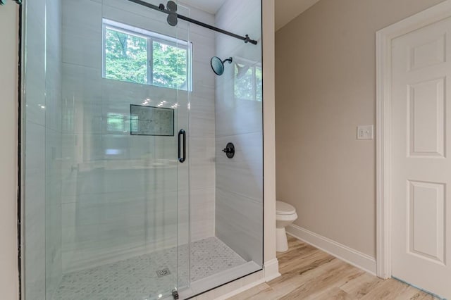 3329 Walt Stephens Rd, Stockbridge, GA 30281 - full bathroom with a shower stall and wood finished floors