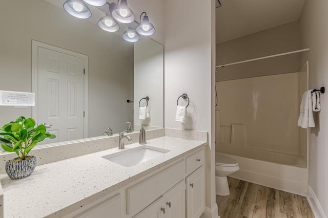 3329 Walt Stephens Rd, Stockbridge, GA 30281 - bathroom featuring vanity,  shower combination, and wood finished floors