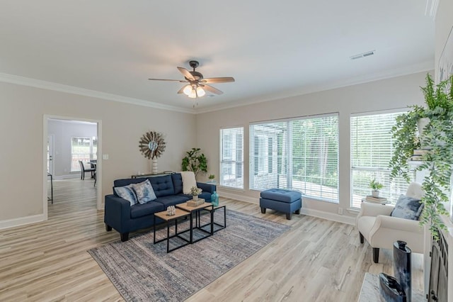 3329 Walt Stephens Rd, Stockbridge, GA 30281 - living area with ceiling fan, light wood-type flooring, and crown molding