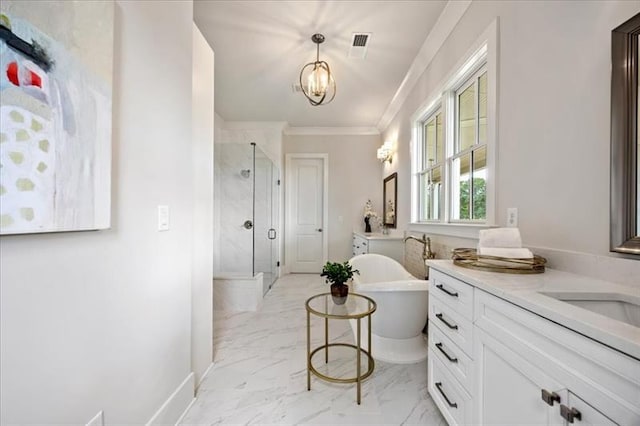 bathroom featuring a freestanding tub, vanity, marble finish floor, ornamental molding, and a shower stall