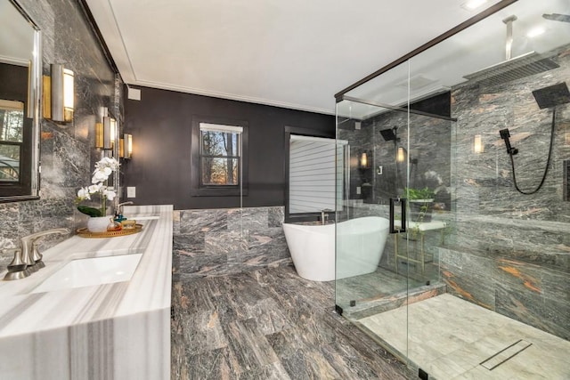 bathroom featuring separate shower and tub and vanity