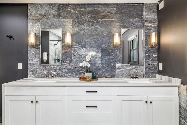 bathroom with decorative backsplash and vanity