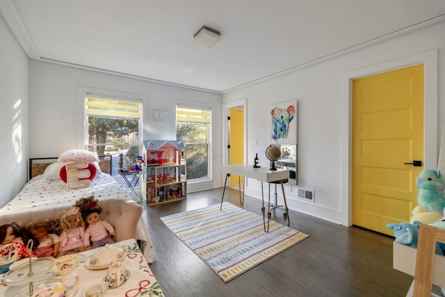 bedroom featuring ornamental molding and dark hardwood / wood-style floors