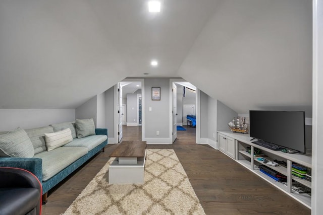 living room with dark wood-type flooring and lofted ceiling