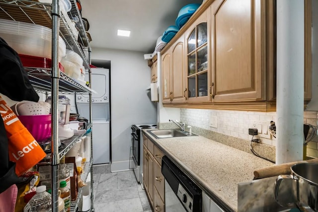 kitchen with stacked washer / dryer, sink, dishwasher, range with electric cooktop, and tasteful backsplash