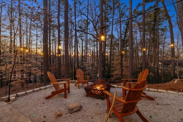 exterior space with a fire pit