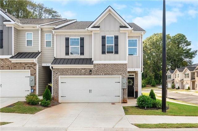 townhome / multi-family property featuring a garage