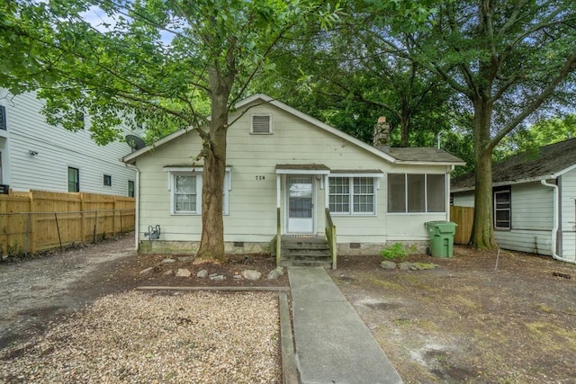 724 Bellemeade Ave NW, Atlanta, GA 30318 - bungalow-style house featuring crawl space, entry steps, and a chimney