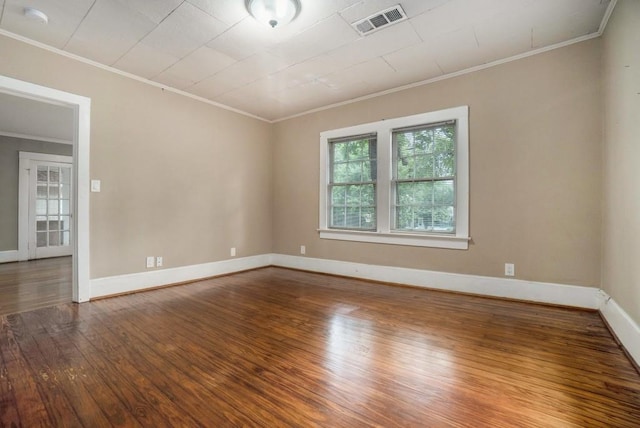 724 Bellemeade Ave NW, Atlanta, GA 30318 - empty room featuring ornamental molding, hardwood / wood-style flooring, and a smoke detector
