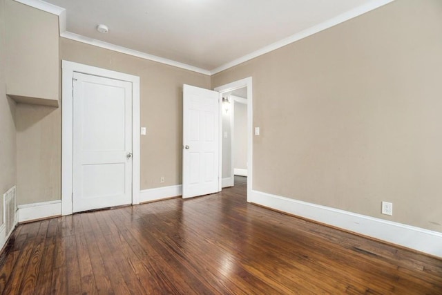 724 Bellemeade Ave NW, Atlanta, GA 30318 - unfurnished bedroom with hardwood / wood-style floors and crown molding