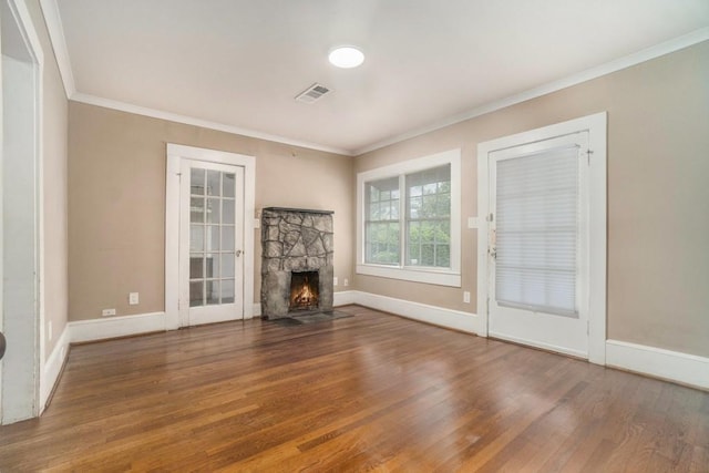 724 Bellemeade Ave NW, Atlanta, GA 30318 - unfurnished living room featuring wood finished floors, crown molding, and a fireplace