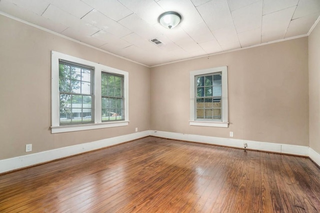 724 Bellemeade Ave NW, Atlanta, GA 30318 - unfurnished room featuring ornamental molding and wood-type flooring