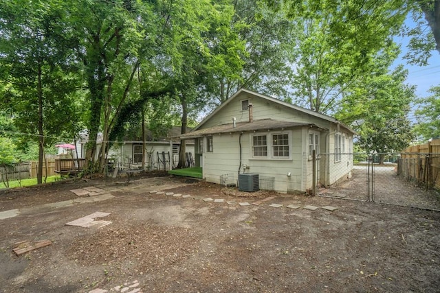 724 Bellemeade Ave NW, Atlanta, GA 30318 - back of house featuring a gate