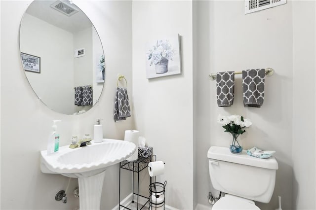 179 Parkside Dr, Stockbridge, GA 30281 - bathroom with toilet and a sink