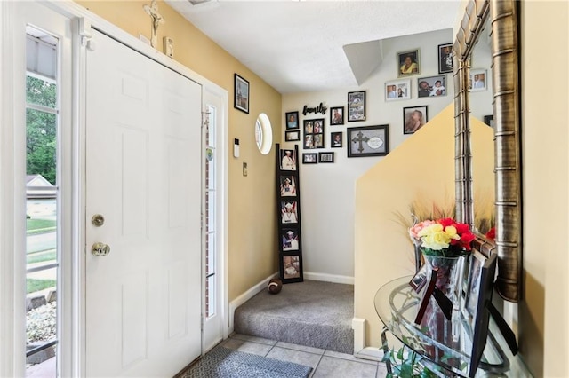 179 Parkside Dr, Stockbridge, GA 30281 - entrance foyer featuring carpet floors and baseboards