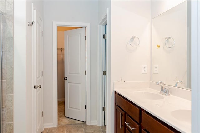 bathroom with vanity and tile patterned floors