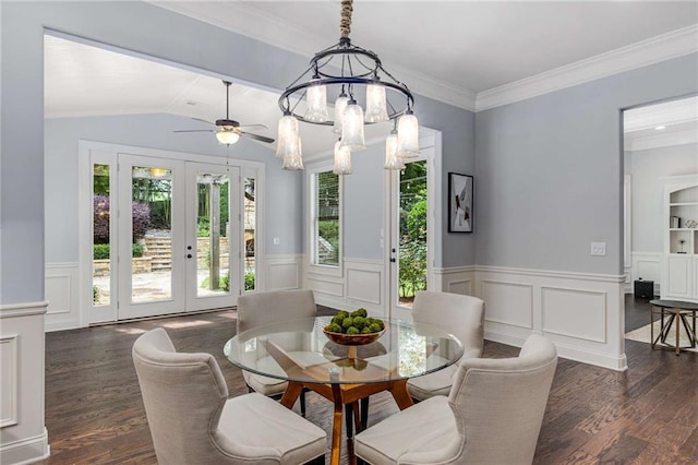 2544 Thompson Rd NE, Brookhaven, GA 30319 - dining space featuring plenty of natural light, french doors, dark wood finished floors, a decorative wall, and wainscoting