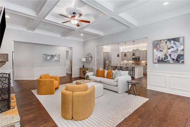 2544 Thompson Rd NE, Brookhaven, GA 30319 - living area featuring coffered ceiling, ceiling fan, beamed ceiling, dark wood-type flooring, and a decorative wall