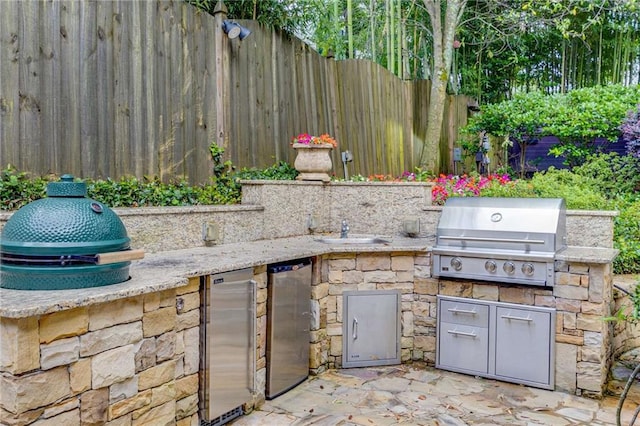 2544 Thompson Rd NE, Brookhaven, GA 30319 - view of patio / terrace with exterior kitchen and a sink