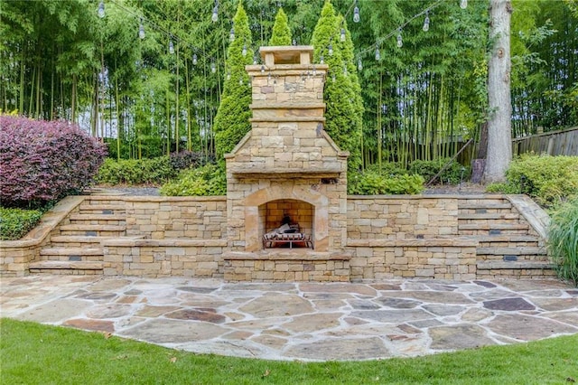 2544 Thompson Rd NE, Brookhaven, GA 30319 - view of patio / terrace with an outdoor stone fireplace