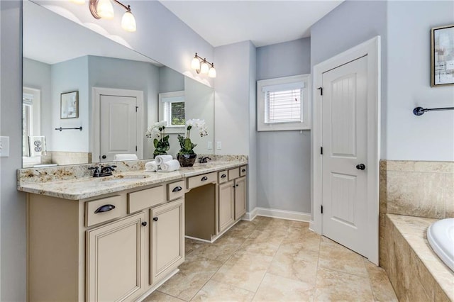 2544 Thompson Rd NE, Brookhaven, GA 30319 - bathroom featuring double vanity and a garden tub