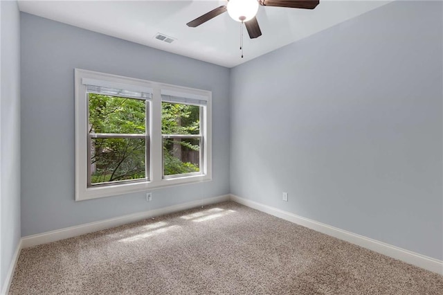2544 Thompson Rd NE, Brookhaven, GA 30319 - spare room with healthy amount of natural light, carpet, and a ceiling fan