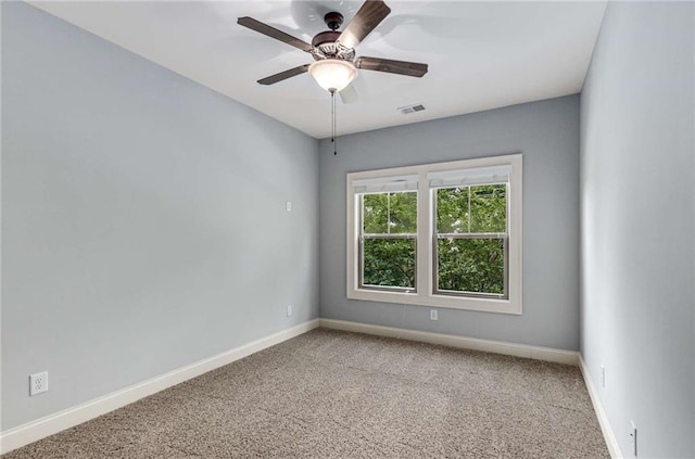 2544 Thompson Rd NE, Brookhaven, GA 30319 - carpeted empty room featuring baseboards and ceiling fan