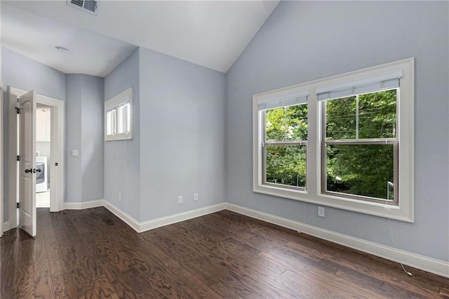2544 Thompson Rd NE, Brookhaven, GA 30319 - spare room featuring dark wood-style floors and lofted ceiling