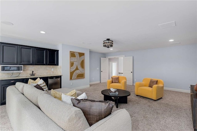 2544 Thompson Rd NE, Brookhaven, GA 30319 - living area featuring light colored carpet and recessed lighting