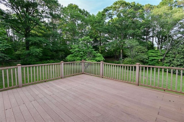 deck featuring a yard