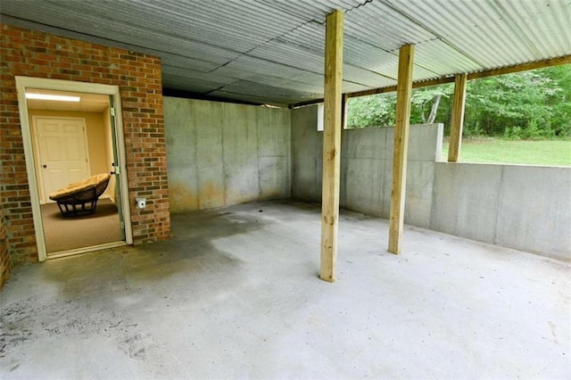 basement with brick wall