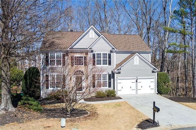 view of front of property featuring driveway